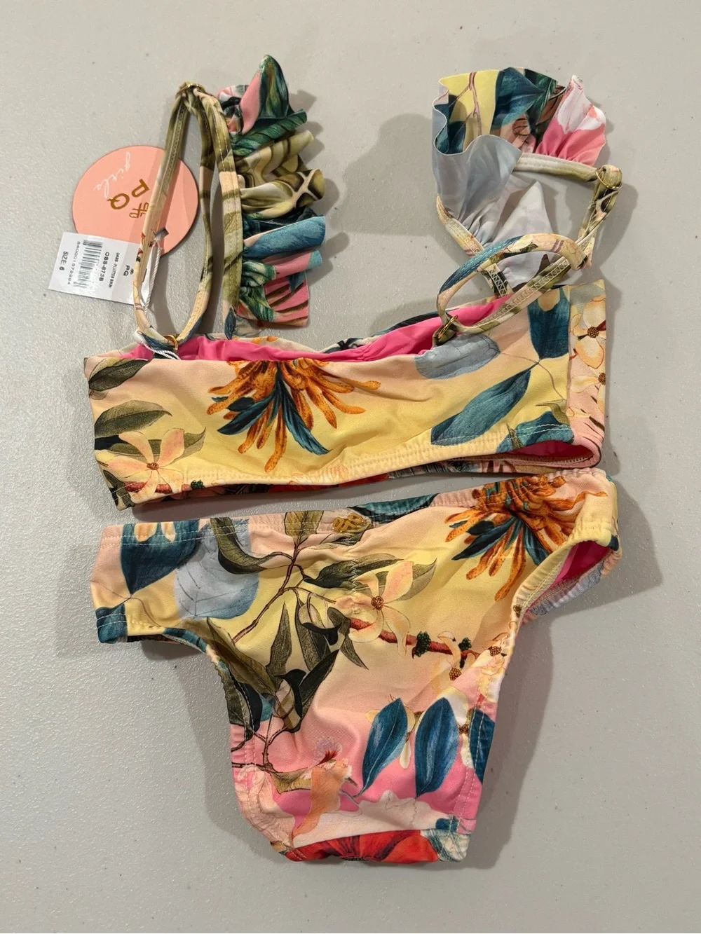 Pilyq Floral Two-Piece Swim Set in Pink, Yellow, Red, Green